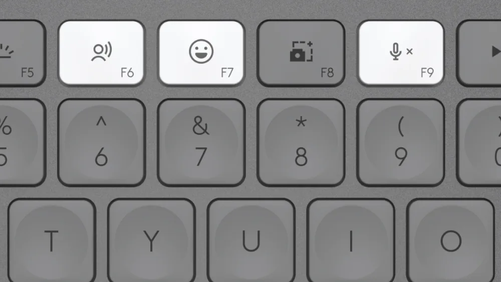 MX Keys Mini ning yuqori qatoridagi diktovka, emoji va mikrofonni oʻchirish tugmalari