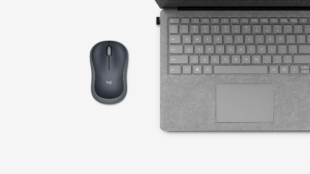 Noutbuk yonidagi kulrang Logitech M185 sichqonchasi
